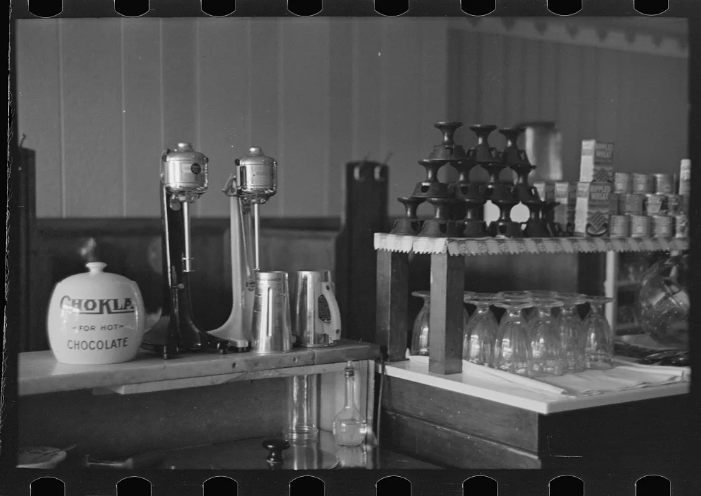 Malted milk mixers in restaurant, Plentywood, Montana, 1937