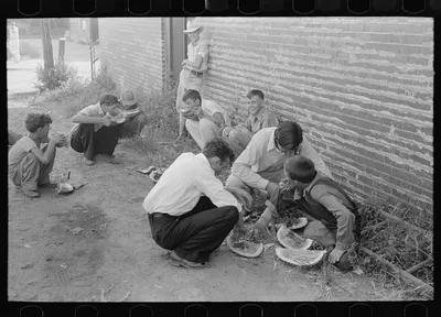 Natives eating watermelons, Steele, Missouri, 1938