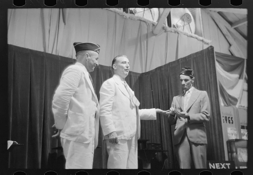 Magician giving performance, state fair, Donaldsonville, Louisiana, 1938