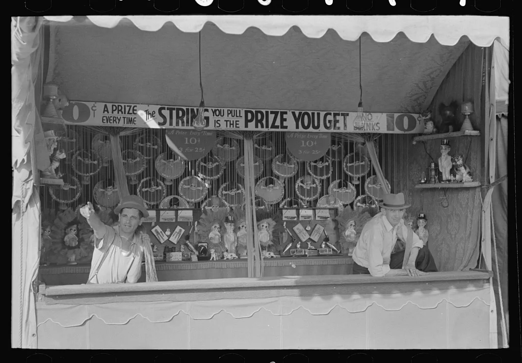 Concession with barker, state fair, Donaldsonville, Louisiana, 1938