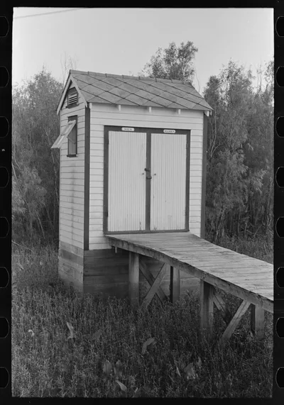 Privy adjacent to barroom, Pilottown, Louisiana, 1938