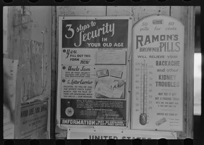 Sign and general store, Olga, Louisiana, 1938