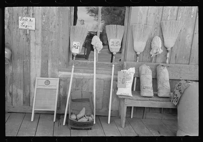 Brooms and charcoal for sale, Jeanerette, Louisiana, 1938