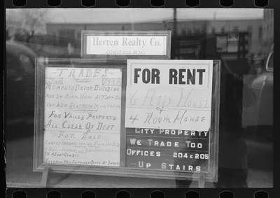 Signs in real estate window, Harlingen, Texas, 1939