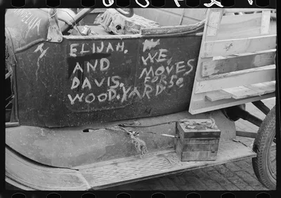 Sign and battery on Negro's truck, Waco, Texas, 1939