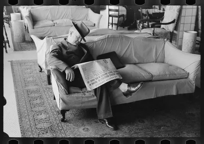 Man asleep in hotel lobby, Taylor, Texas, 1939