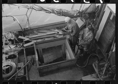 Washing off fishing boat, Astoria, Oregon, 1941
