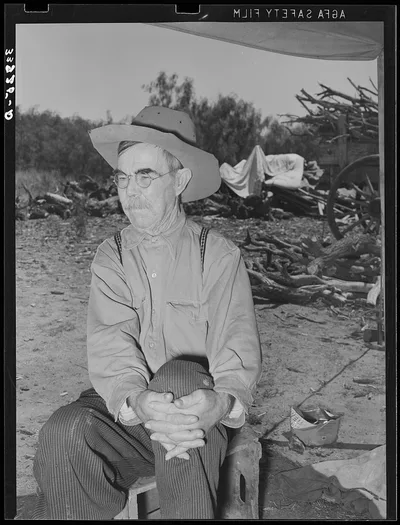 Old cowboy who was formerly employed at the SMS Ranch near Spur, Texas, 1939