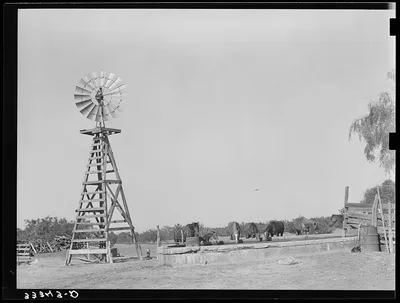 Windmill and watering trough on SMS Ranch near Spur, Texas, 1939