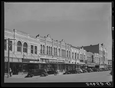 Scene in business section of Gonzales, Texas, 1939