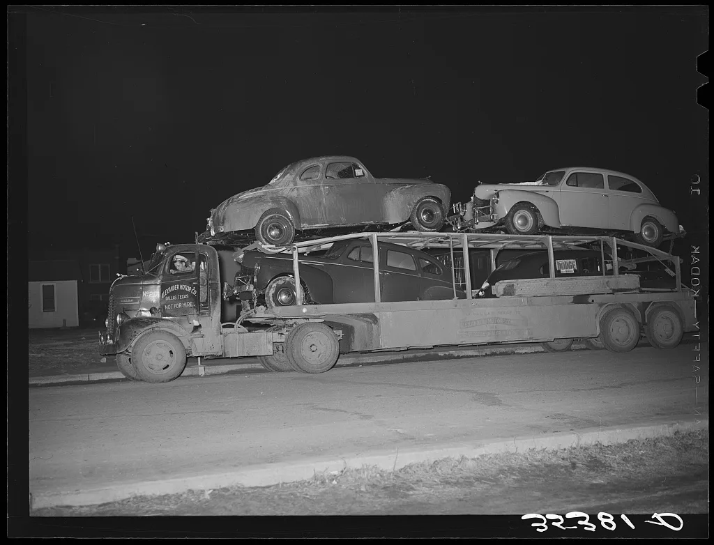 Auto transport passing through Eufaula, Oklahoma, 1940