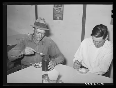 Farmers eating ice cream. Pie Town, New Mexico, 1940