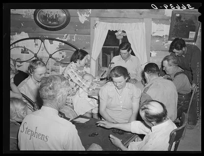 Homesteaders playing Forty-two. Pie Town, New Mexico, 1940