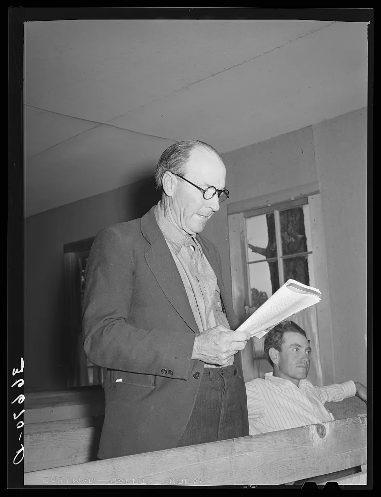Reading part of a lesson at Sunday school. Pie Town, New Mexico, 1940