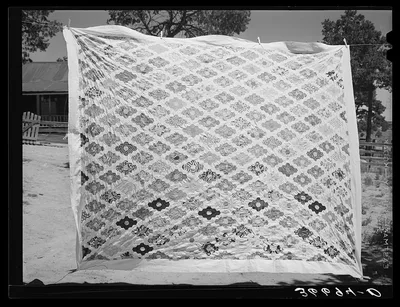 Quilt made by Mrs. Bill Stagg. Pie Town, New Mexico, 1940