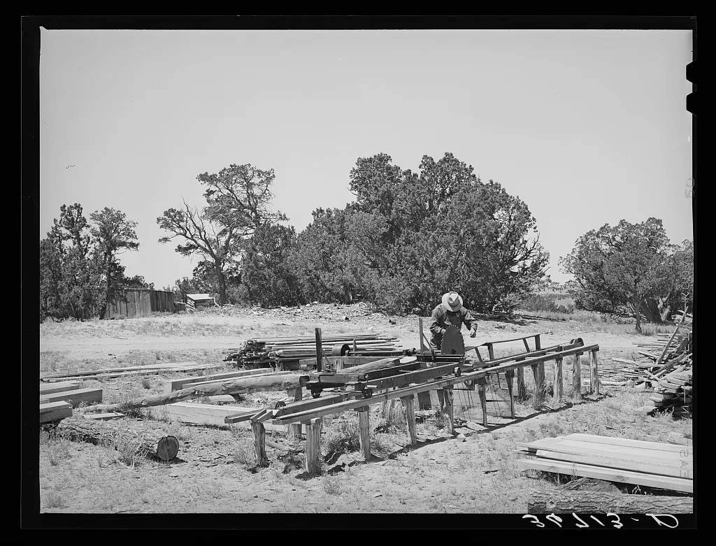 George Hutton working at the small sawmill which he built on his…, New Mexico, 1940