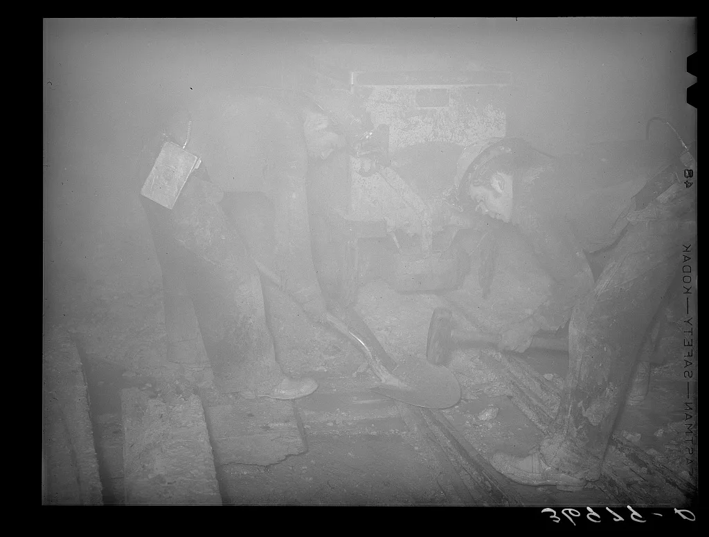 [Untitled photo, possibly related to: Mucking gold ore at mine.…, New Mexico, 1940