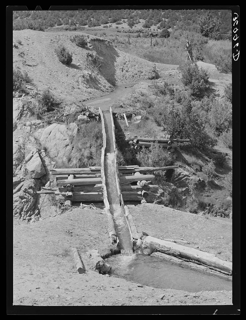 Hollowed-out logs used for transporting irrigation waters across…, New Mexico, 1940