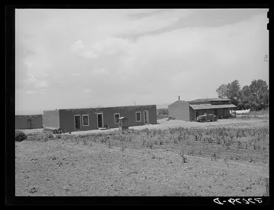 [Untitled photo, possibly related to: Adobe house with small patch of…, New Mexico, 1940