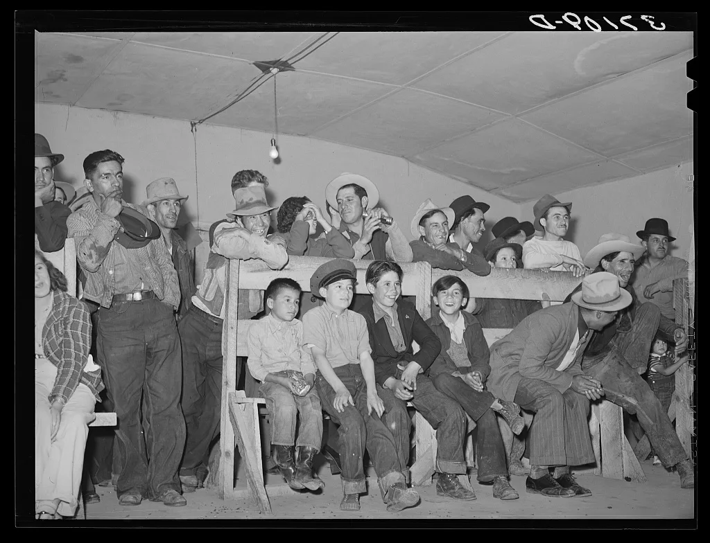 Audience of Spanish-Americans at traveling show. Penasco, New Mexico, 1940