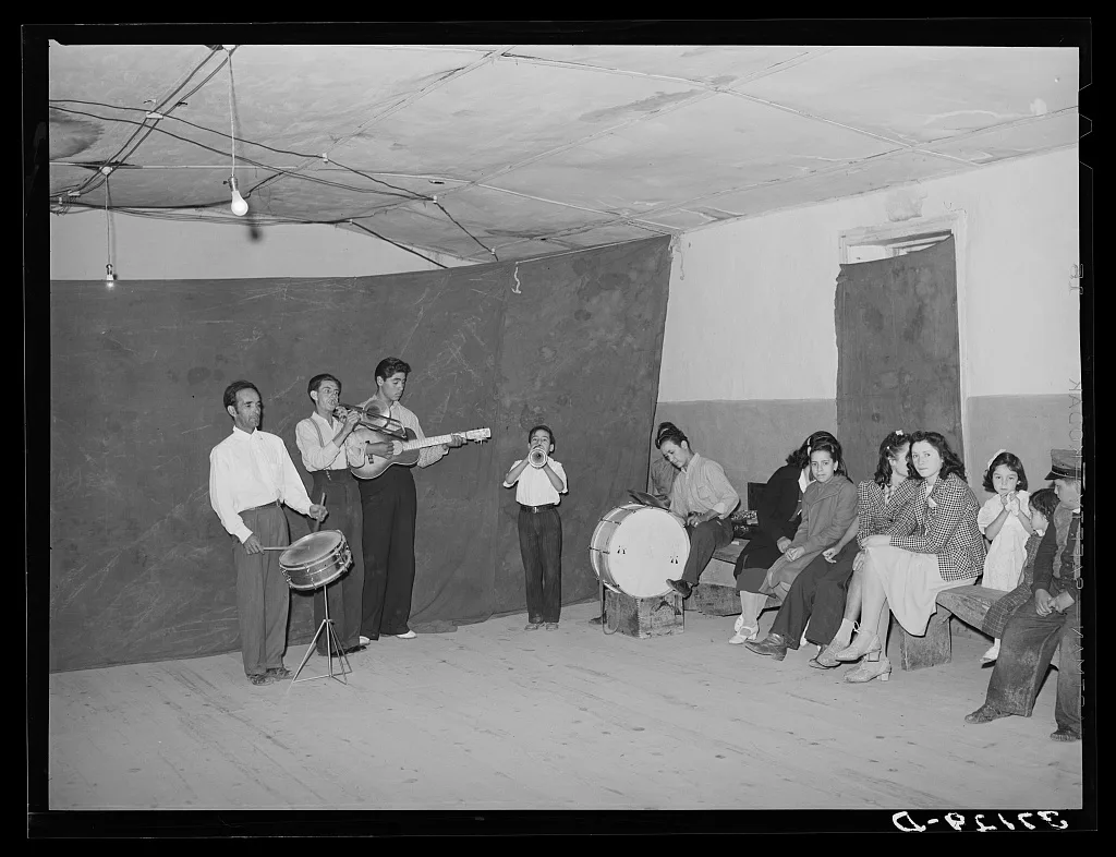 Orchestra and audience at Spanish-American traveling show. Penasco,…, New Mexico, 1940