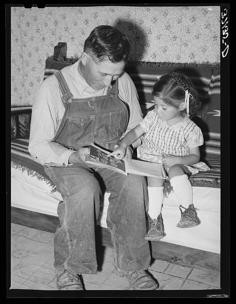 Spanish-American farmer and his daughter. Chamisal, New Mexico, 1940