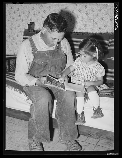 Spanish-American farmer and his daughter. Chamisal, New Mexico, 1940