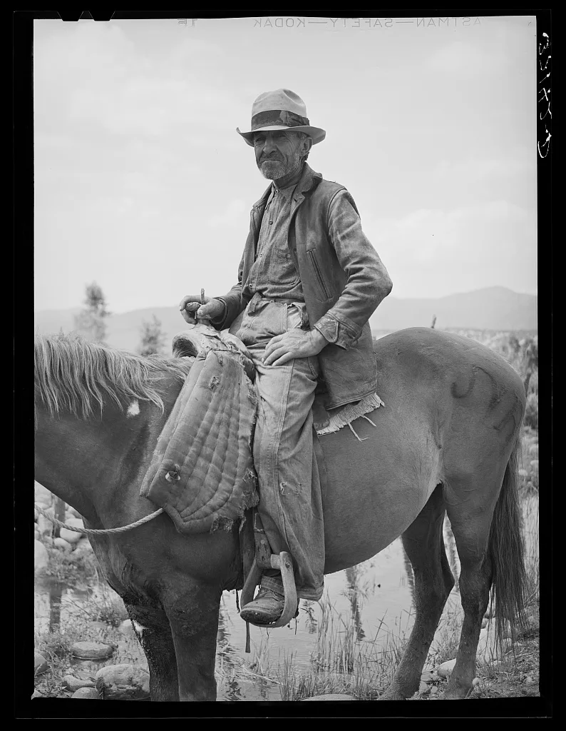 Spanish-American farmer on his horse. Rodarte, New Mexico, 1940