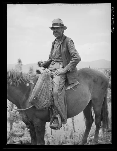 Spanish-American farmer on his horse. Rodarte, New Mexico, 1940
