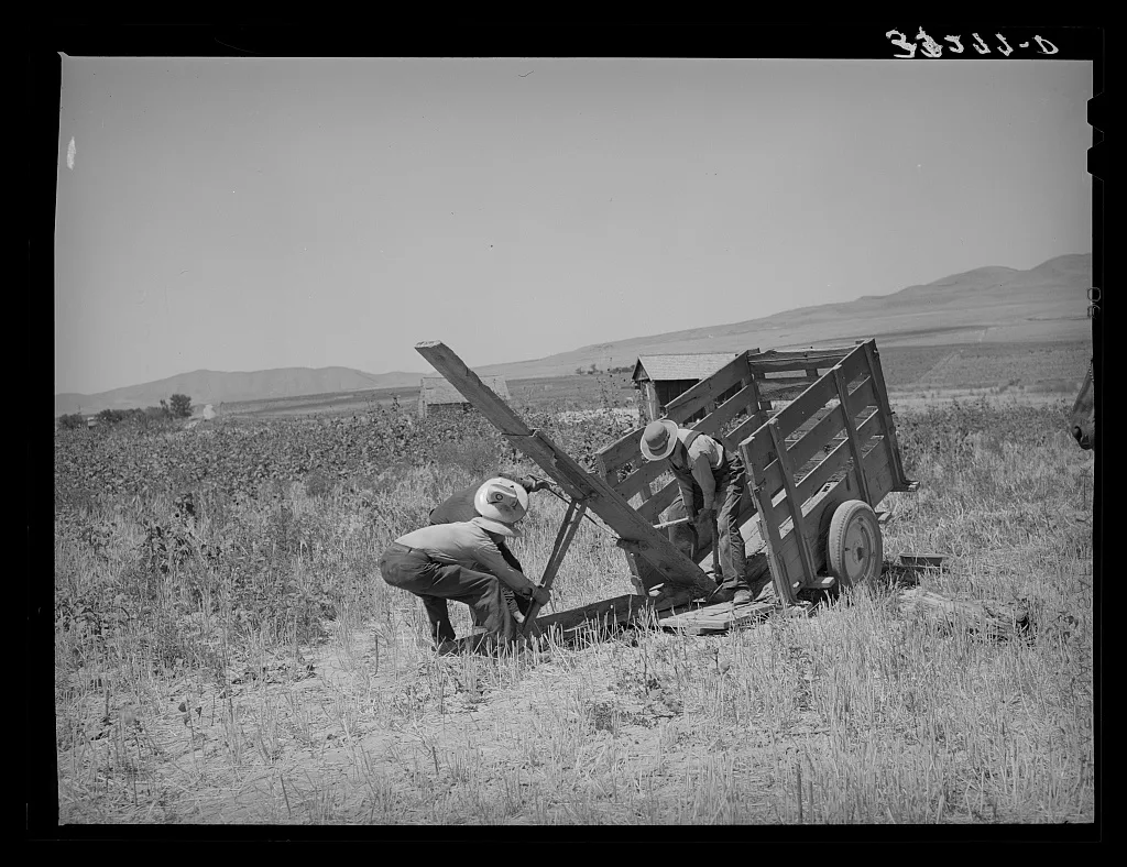 Unloading FSA (Farm Security Administration) cooperative ditcher from…, Utah, 1940