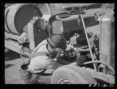 [Untitled photo, possibly related to: Pouring gasoline into tank of…, Utah, 1940