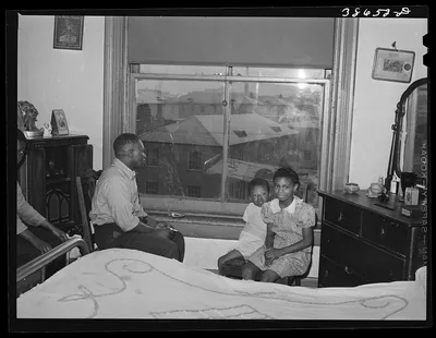 Front room of apartment rented by Negroes. Ida B. Wells Housing…, Illinois, 1941