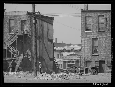 Apartment houses and funeral parlor in Negro section of Chicago,…, Illinois, 1941