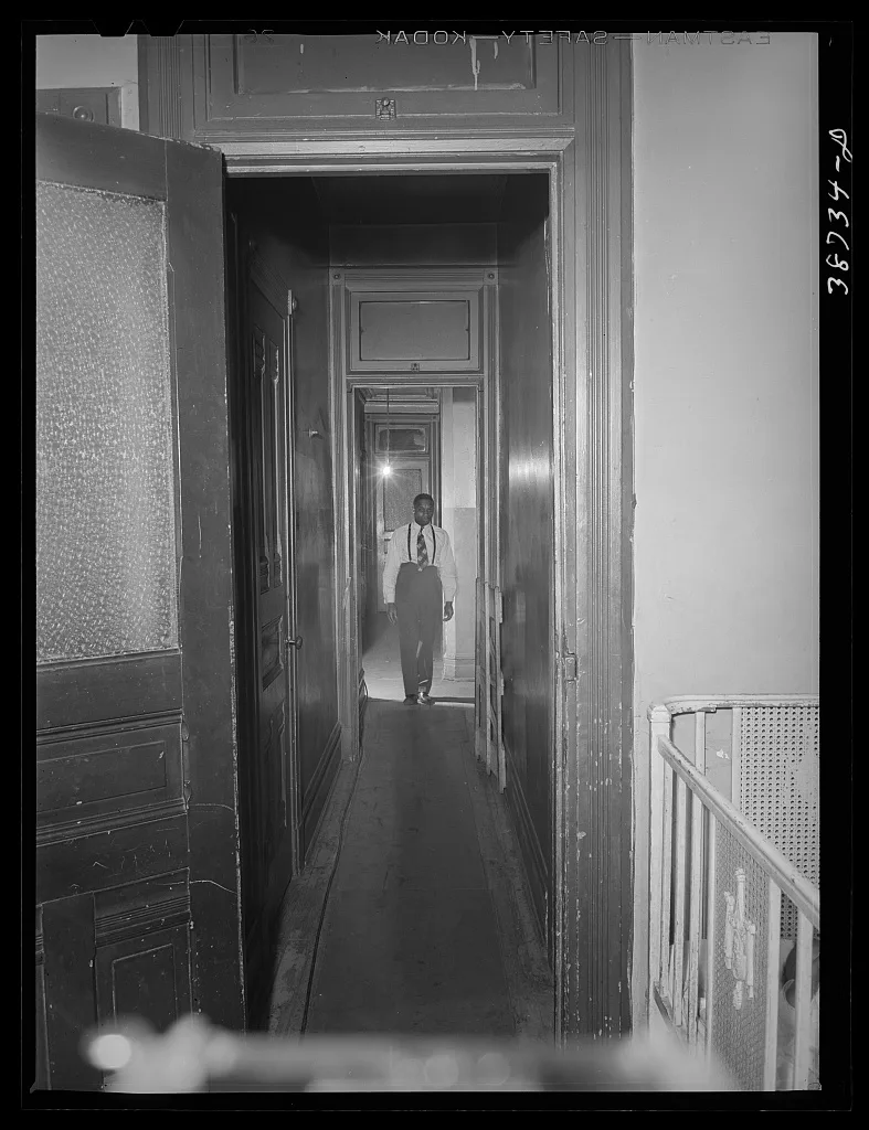 Hall leading to apartment of Negro railroad worker. Chicago, Illinois, 1941