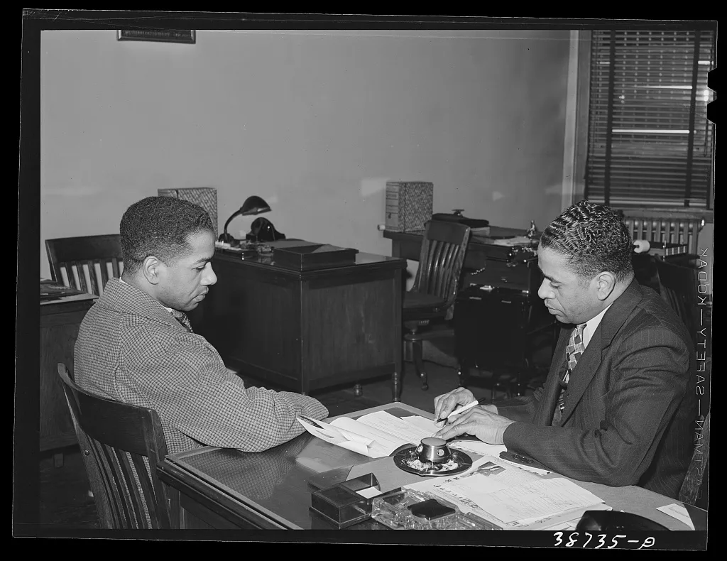 Real estate office catering to Negroes. Chicago, Illinois, 1941