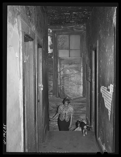 Hall of second floor of building rented as rooming house. Chicago,…, Illinois, 1941