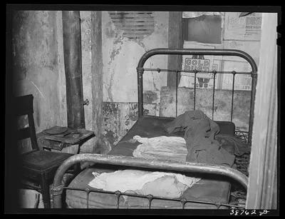 [Untitled photo, possibly related to: Room in rooming house for…, Illinois, 1941
