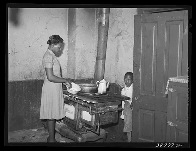 Corner of kitchen of apartment rented to Negroes. Chicago, Illinois, 1941