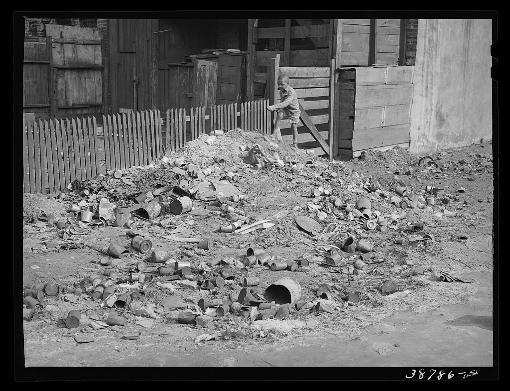 Rubbish piles are frequent in the Negro sections of Chicago, Illinois, 1941