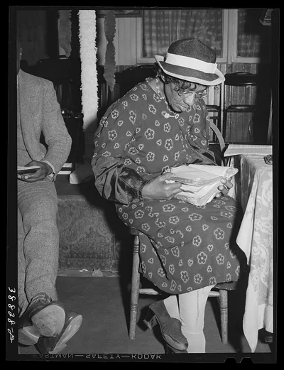 Reading the Bible in the "storefront" Baptist church. Chicago,…, Illinois, 1941
