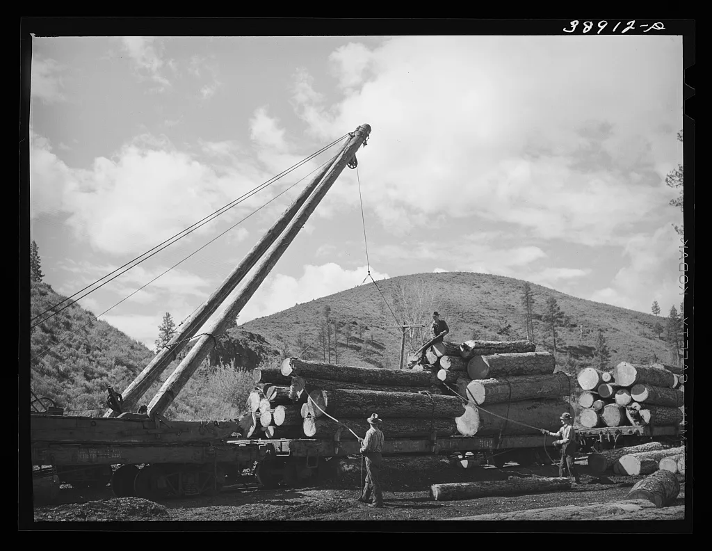 Loading logs onto railroad cars for transportation into town. Baker…, Oregon, 1941