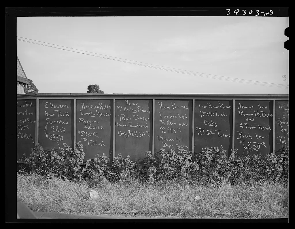 Sign in front of real estate office. San Diego, California, 1941