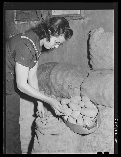 Mrs. Lee Wagoner, wife of Black Canyon Project farmer, gets homegrown…, Idaho, 1941