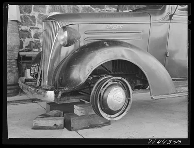 Sonoma County, California. Wine delivery truck raised on blocks…, 1942