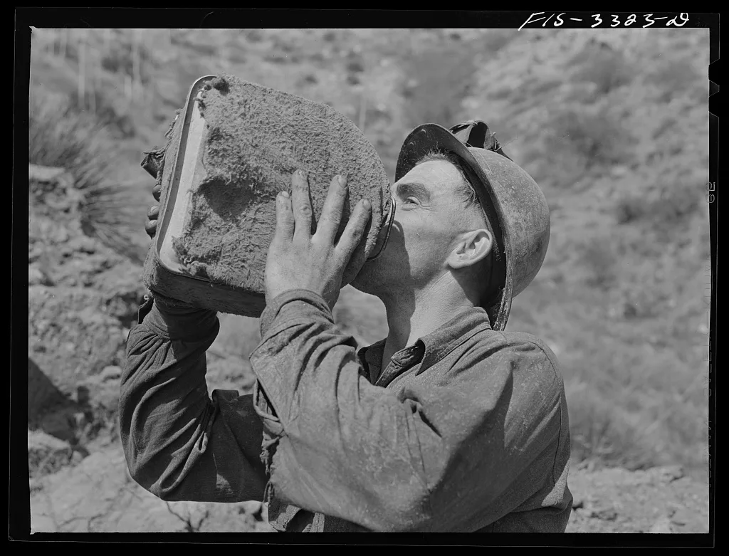 Kern County, California. Tungsten Chief Mine. Tungsten miner drinking…, 1942